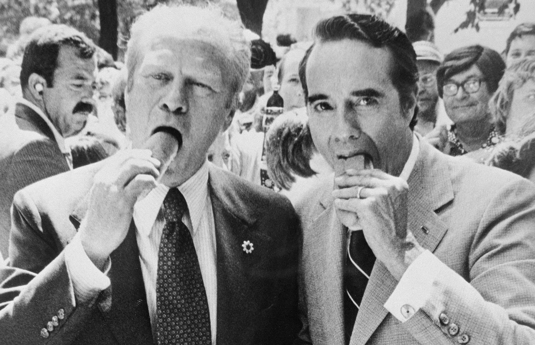1970s: President Gerald Ford eats a hot dog