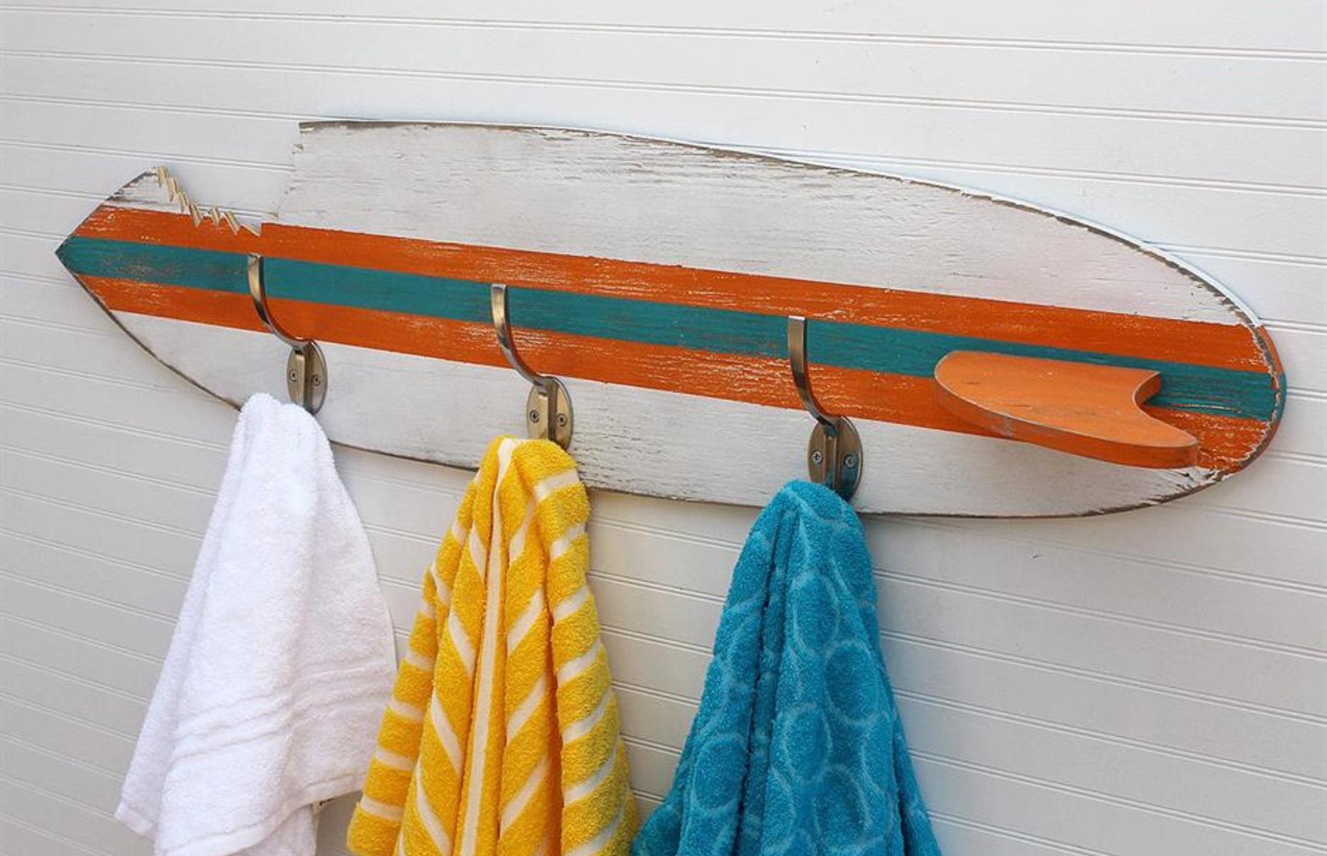 Surfboard towel rack