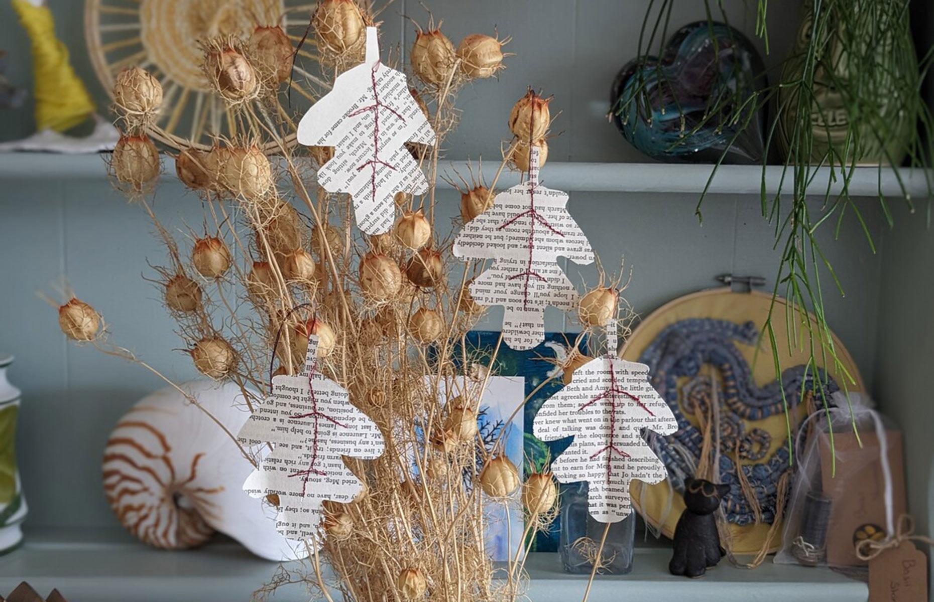 Snip oak leaves from old books