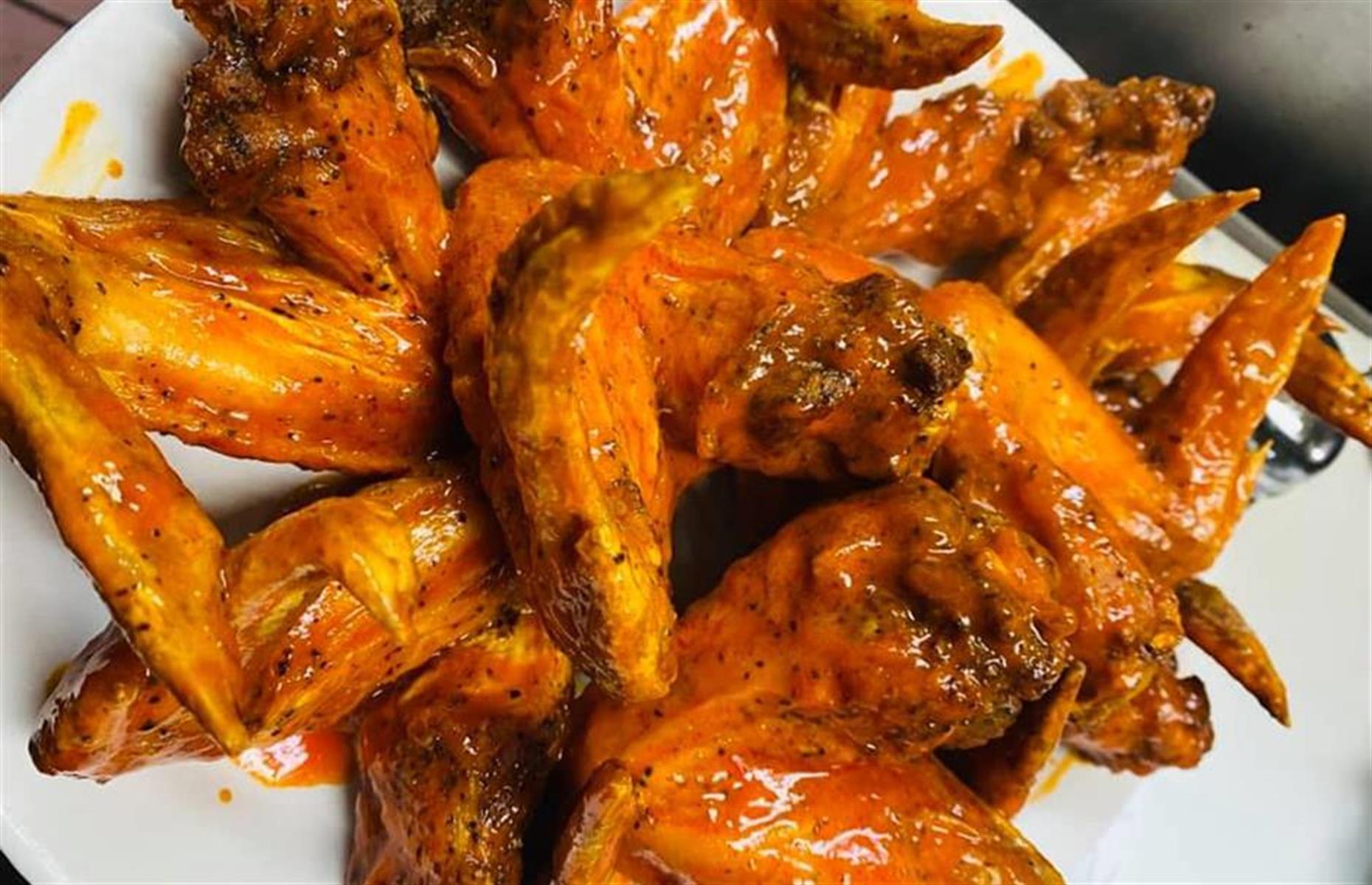 Kansas: Buffalo chicken wings, The Peanut, various locations