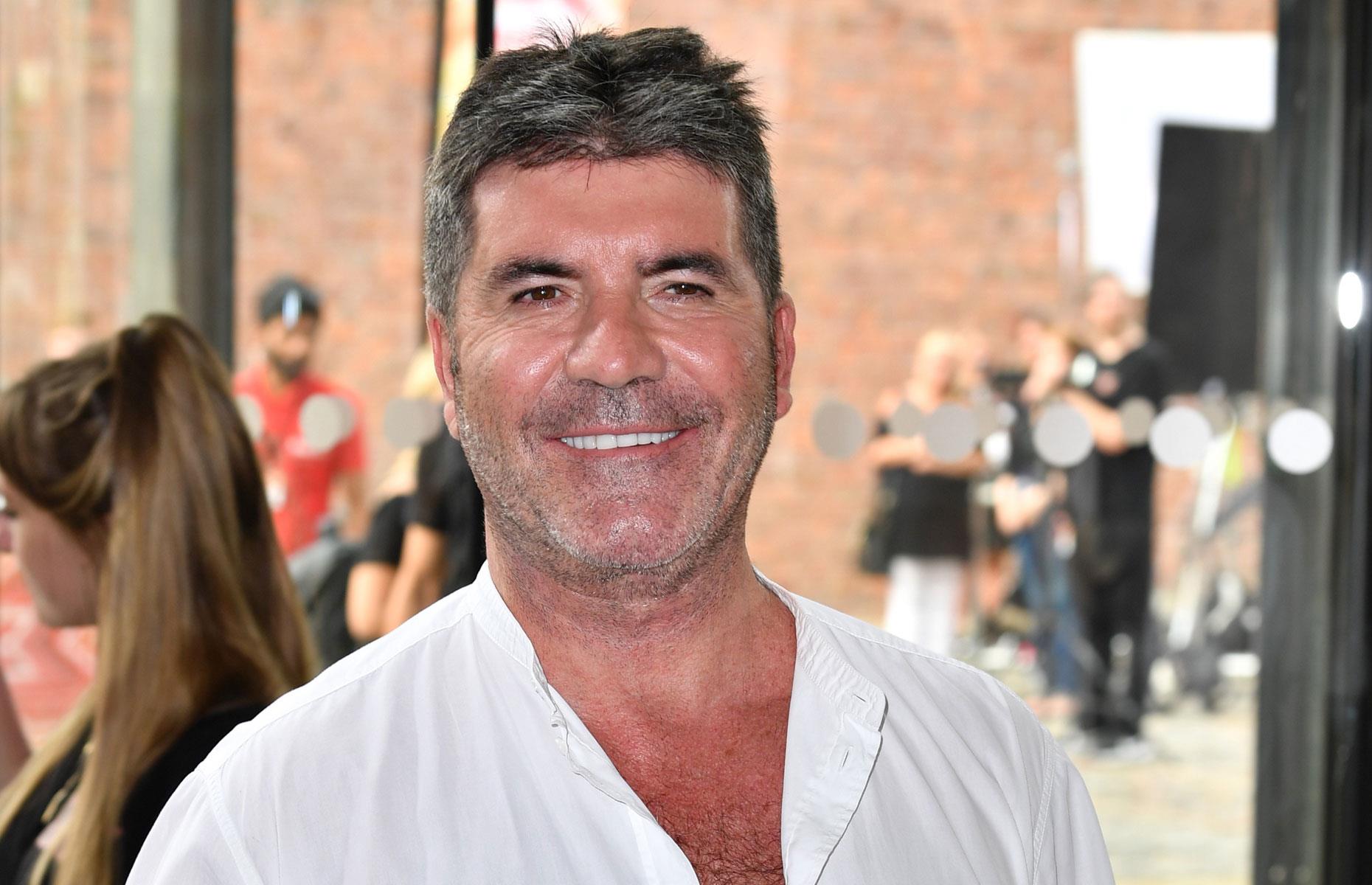 Simon Cowell watches cartoons