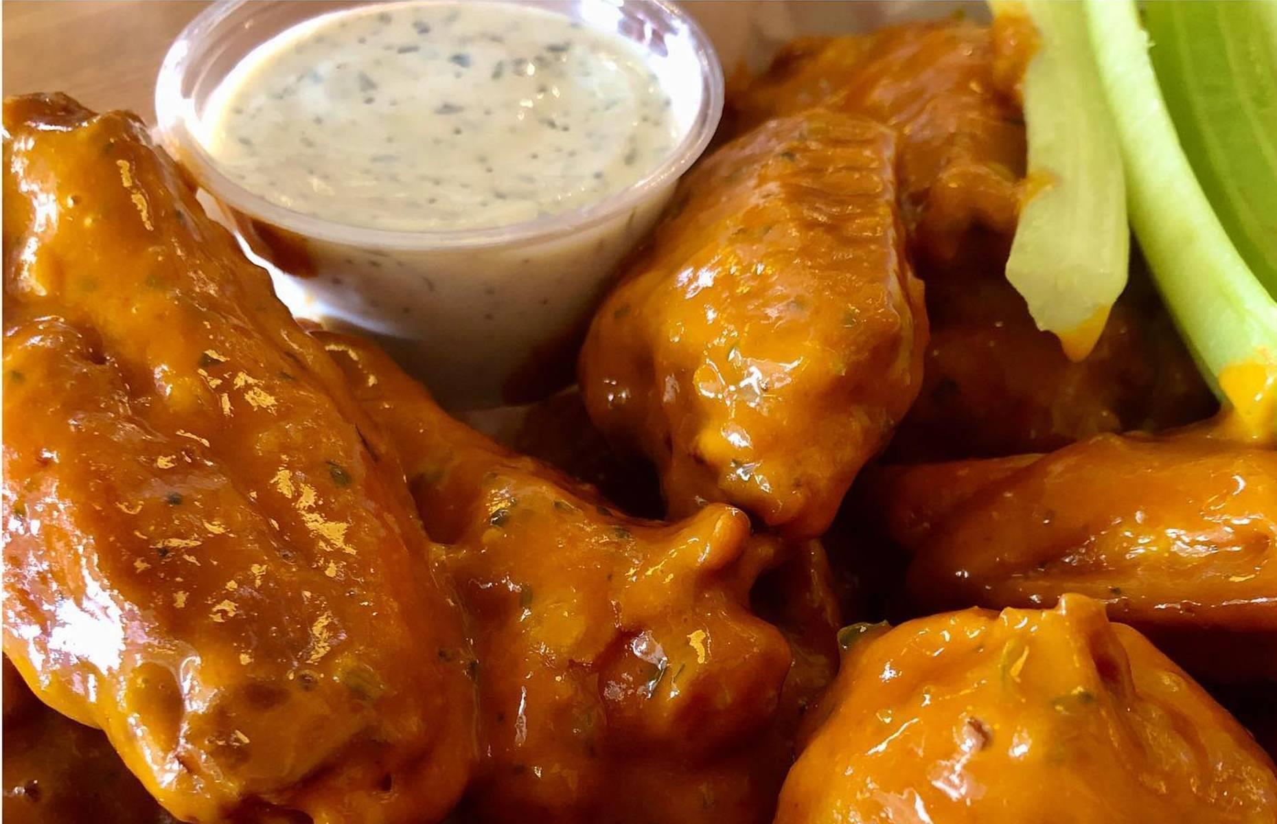 Colorado: spicy peanut traditional bone-in chicken wings, Fire on the Mountain, Denver