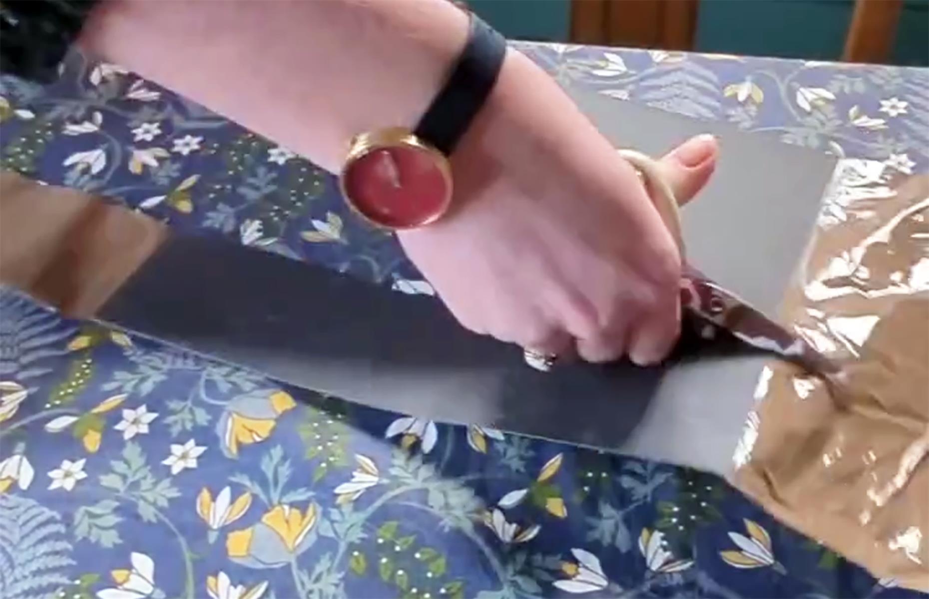 Make sturdy sandpaper strips to prep stair spindles