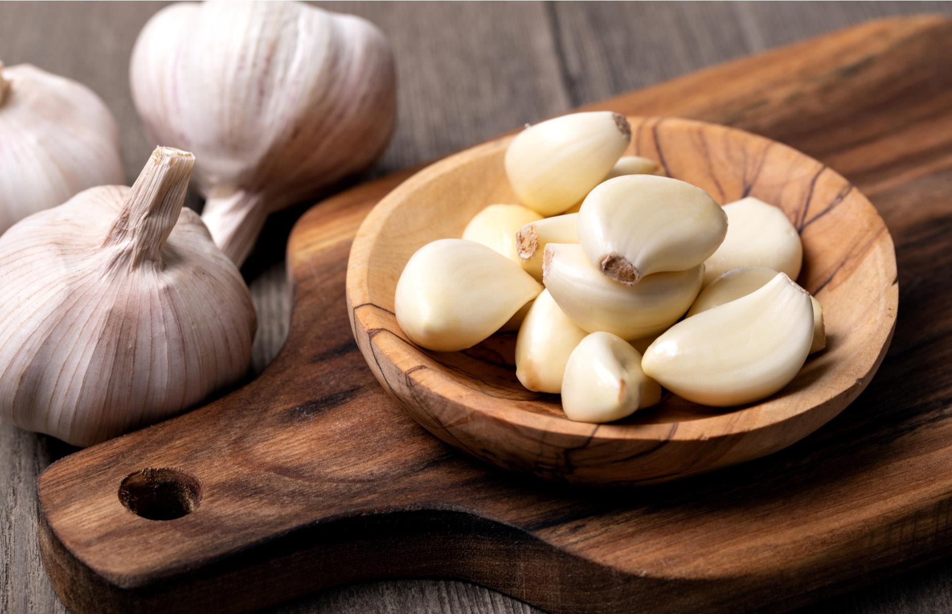 29. Slice sprouting stems from garlic