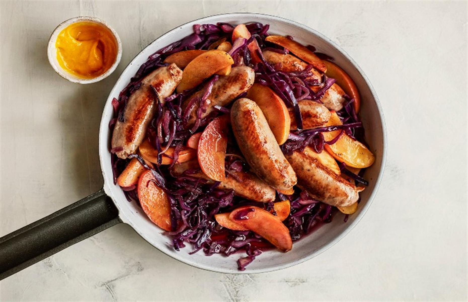 Quick braised red cabbage, sausages and apples