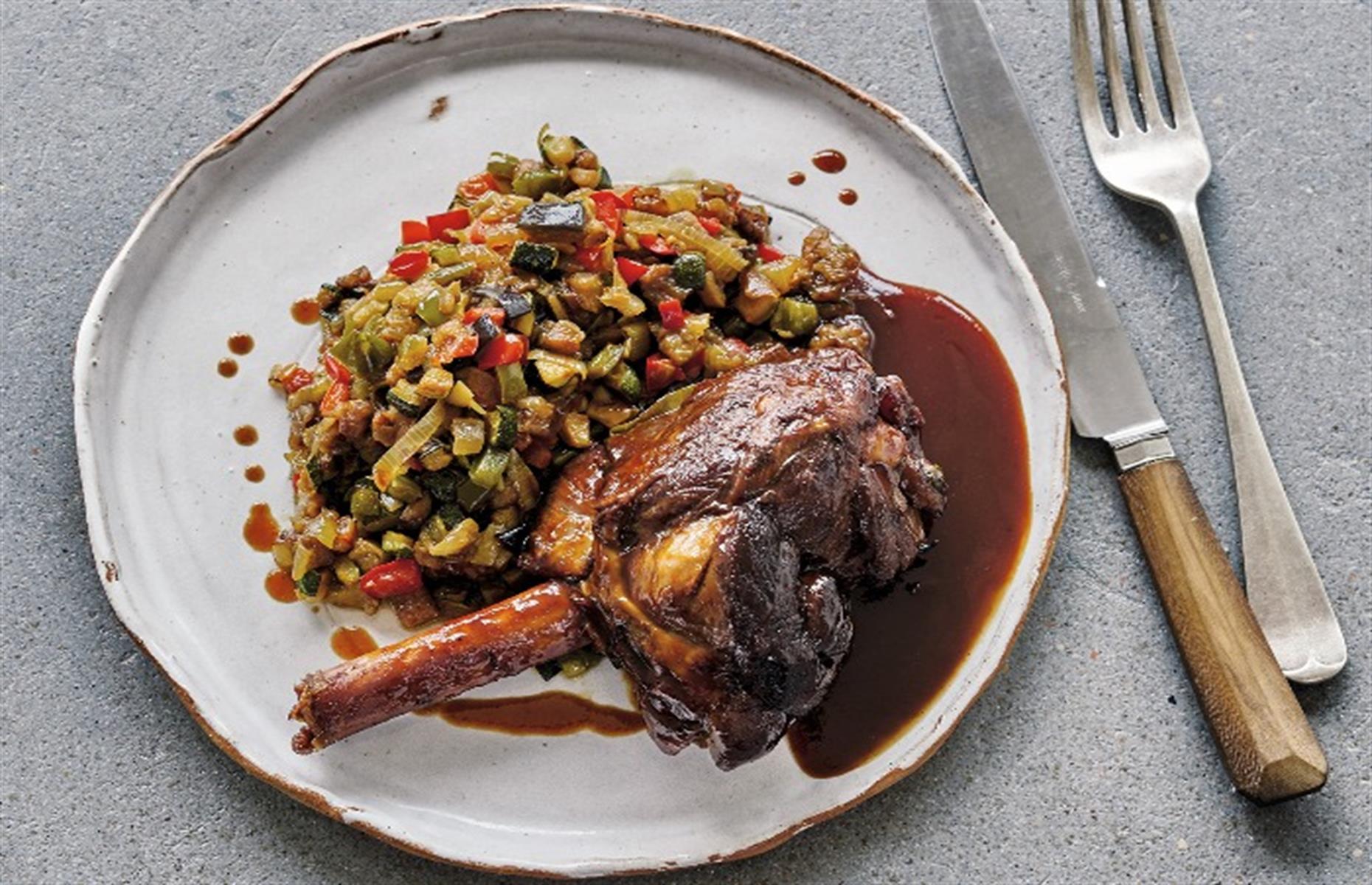 Slow-cooked lamb shank with braised vegetables