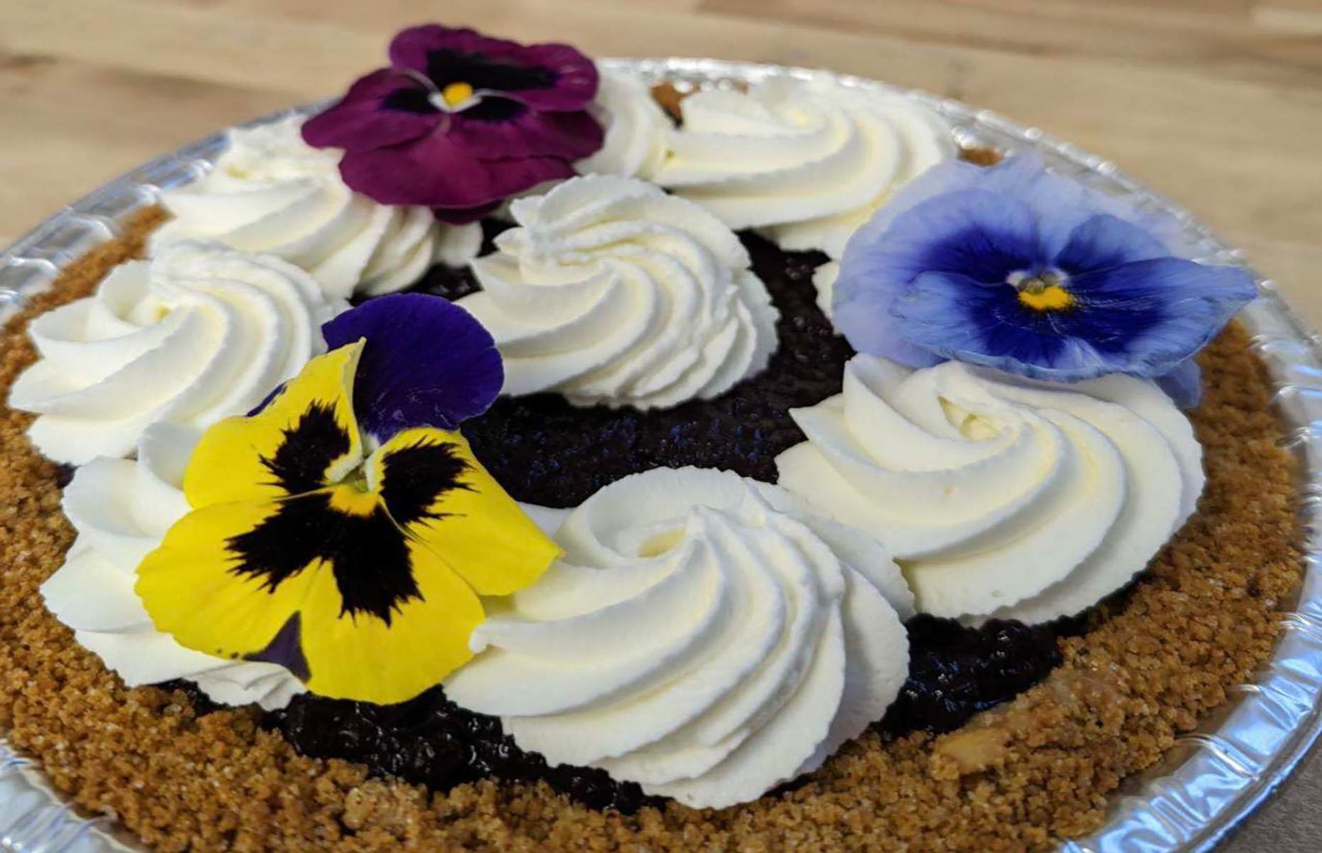 Vermont: lemon blueberry pie with edible pansies, Poorhouse Pies, Underhill. 