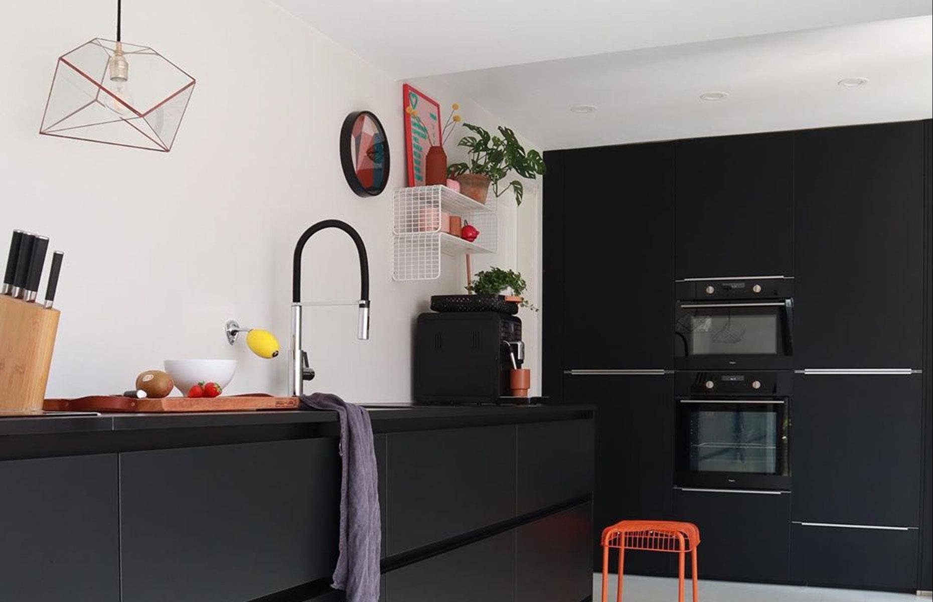 Sleek and contemporary black kitchen