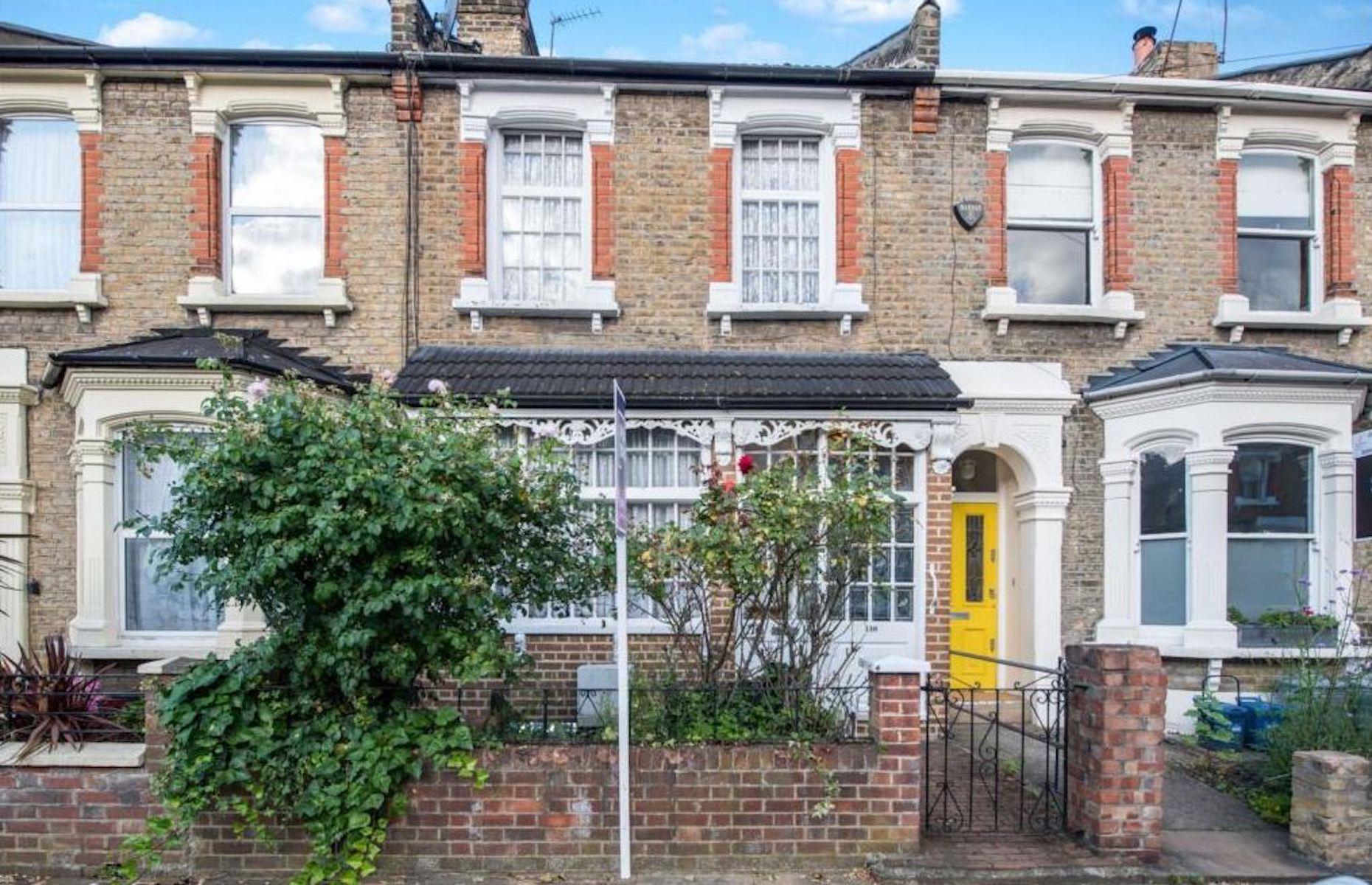 Victorian terrace with tavern, London, UK