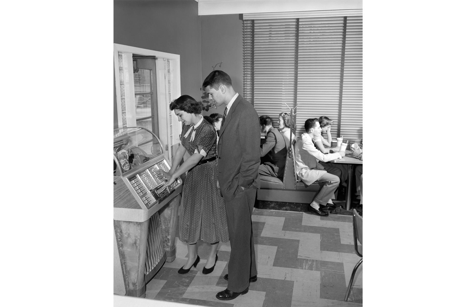A jukebox at the malt shop, 1950s