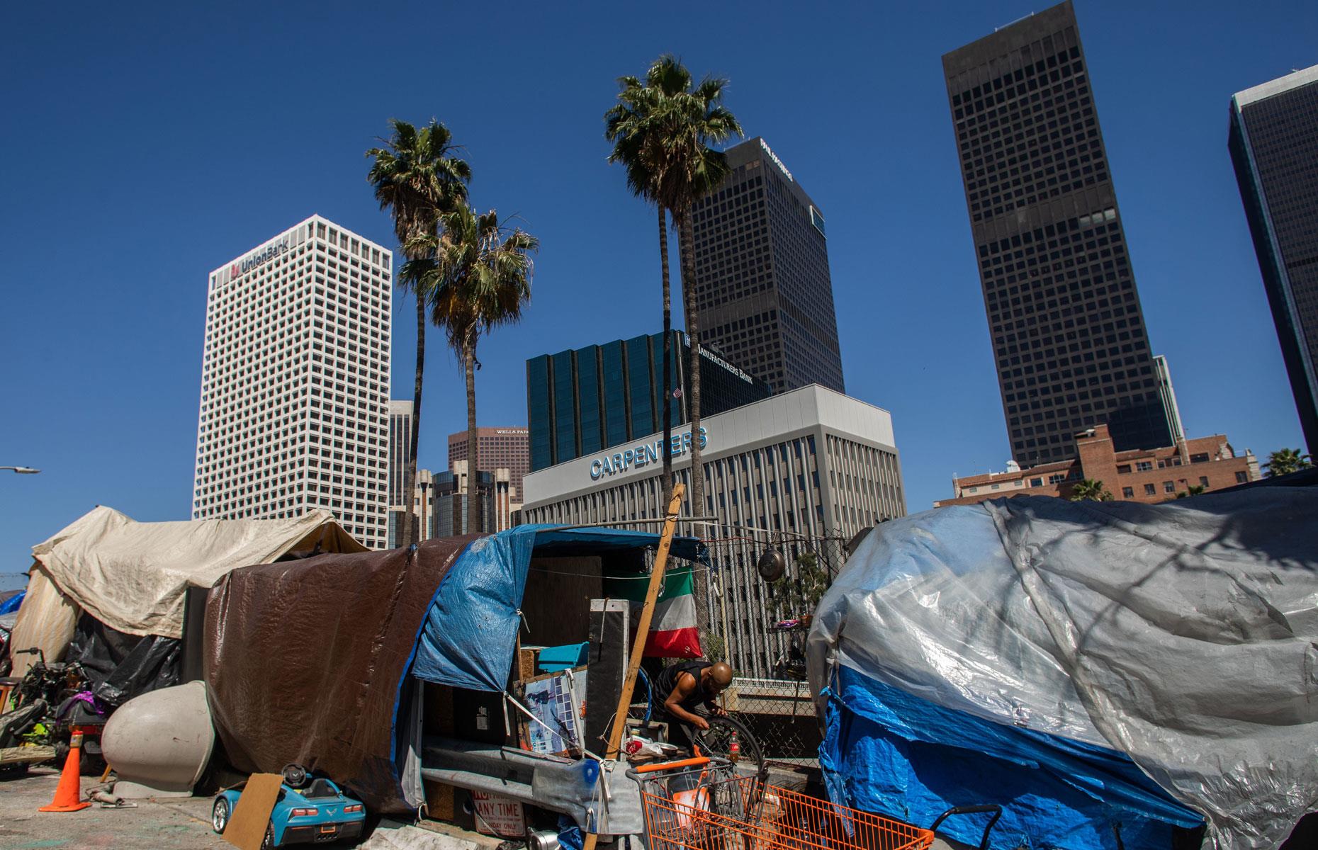 Round up the homeless into tent cities