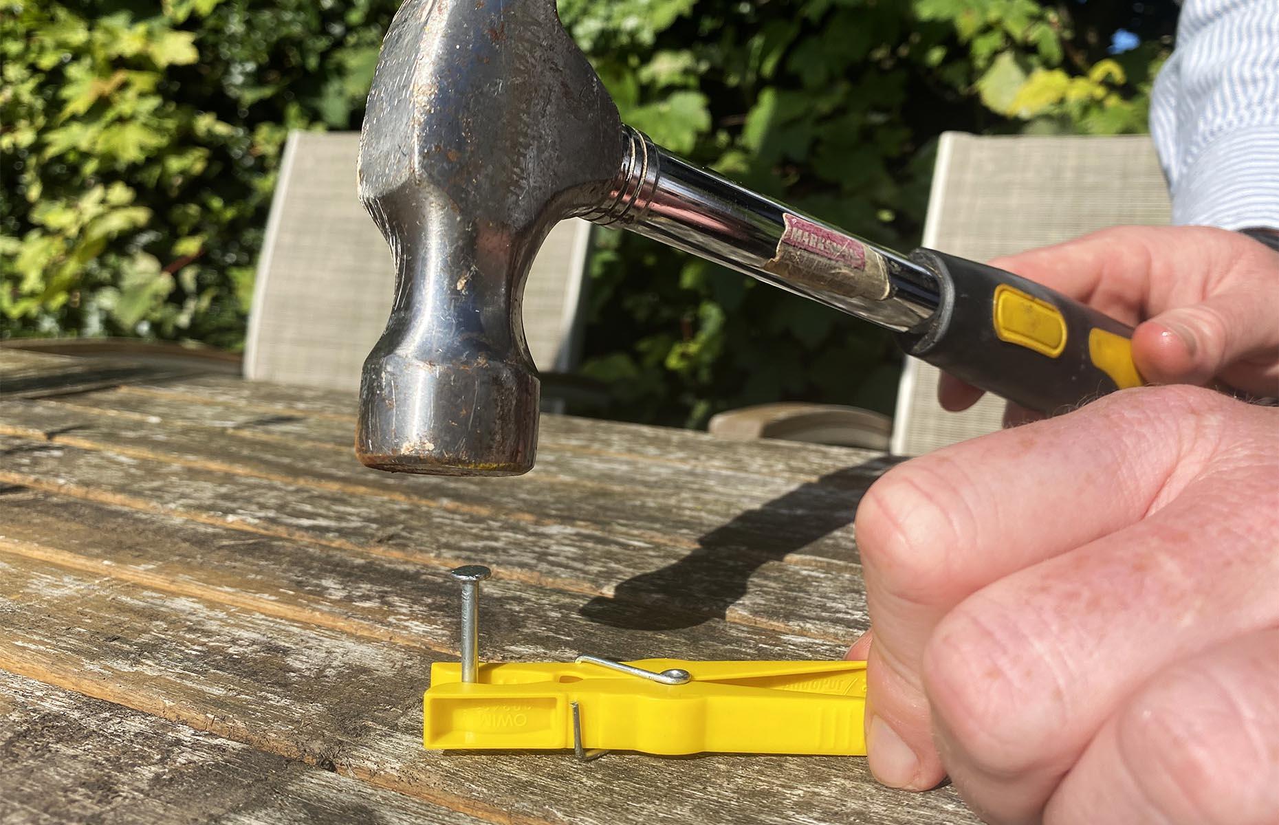 Hammer nails with a clothes peg