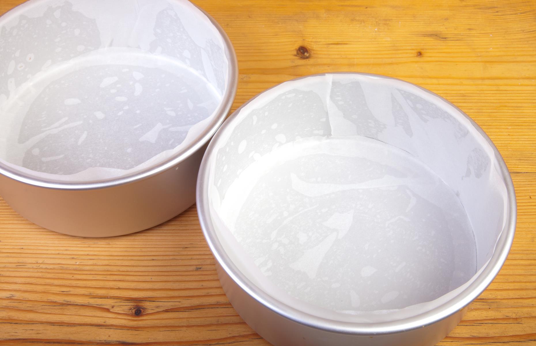 Line cake tins to prevent sticking