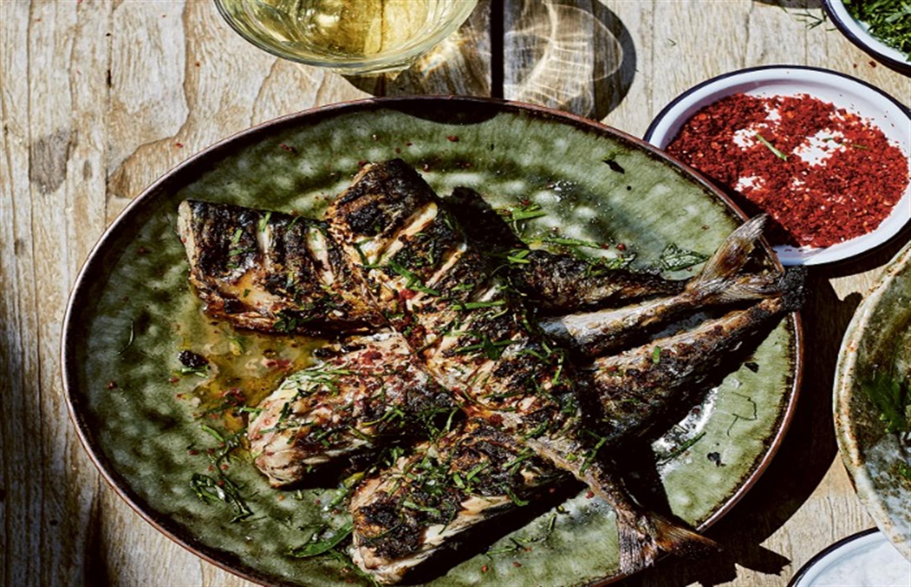 Charred whole mackerel with garlic
