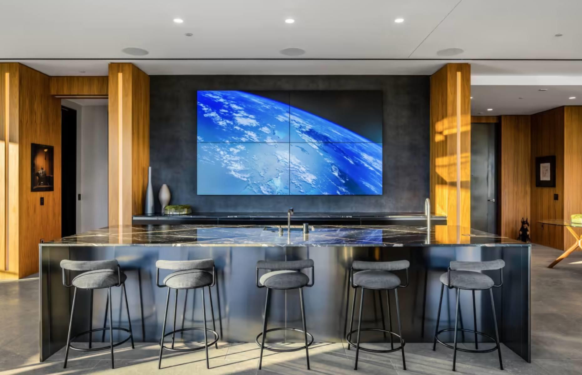 A wall-sized television
