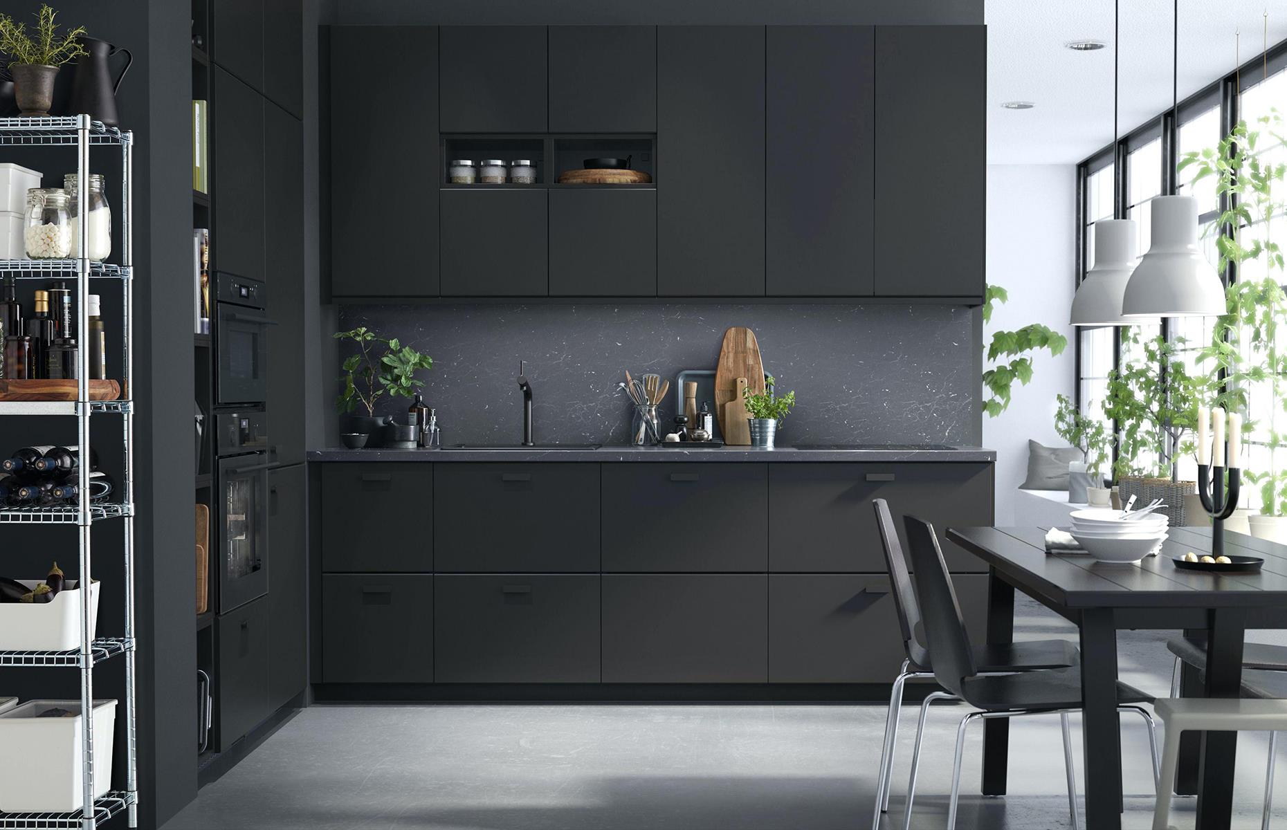 Moody black and metallic kitchen 
