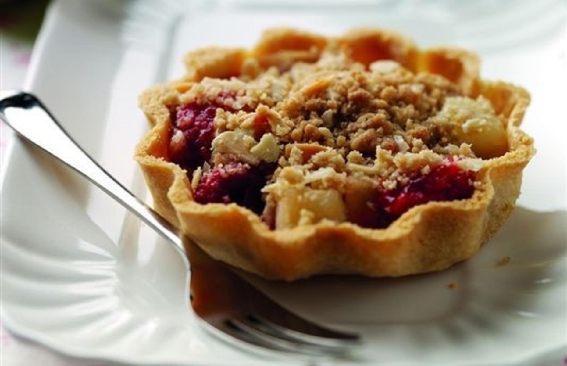 Apple, raspberry and almond crumble tarts