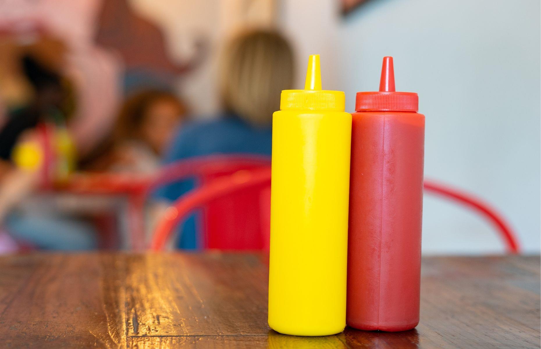 17. Bottled ketchup on the table
