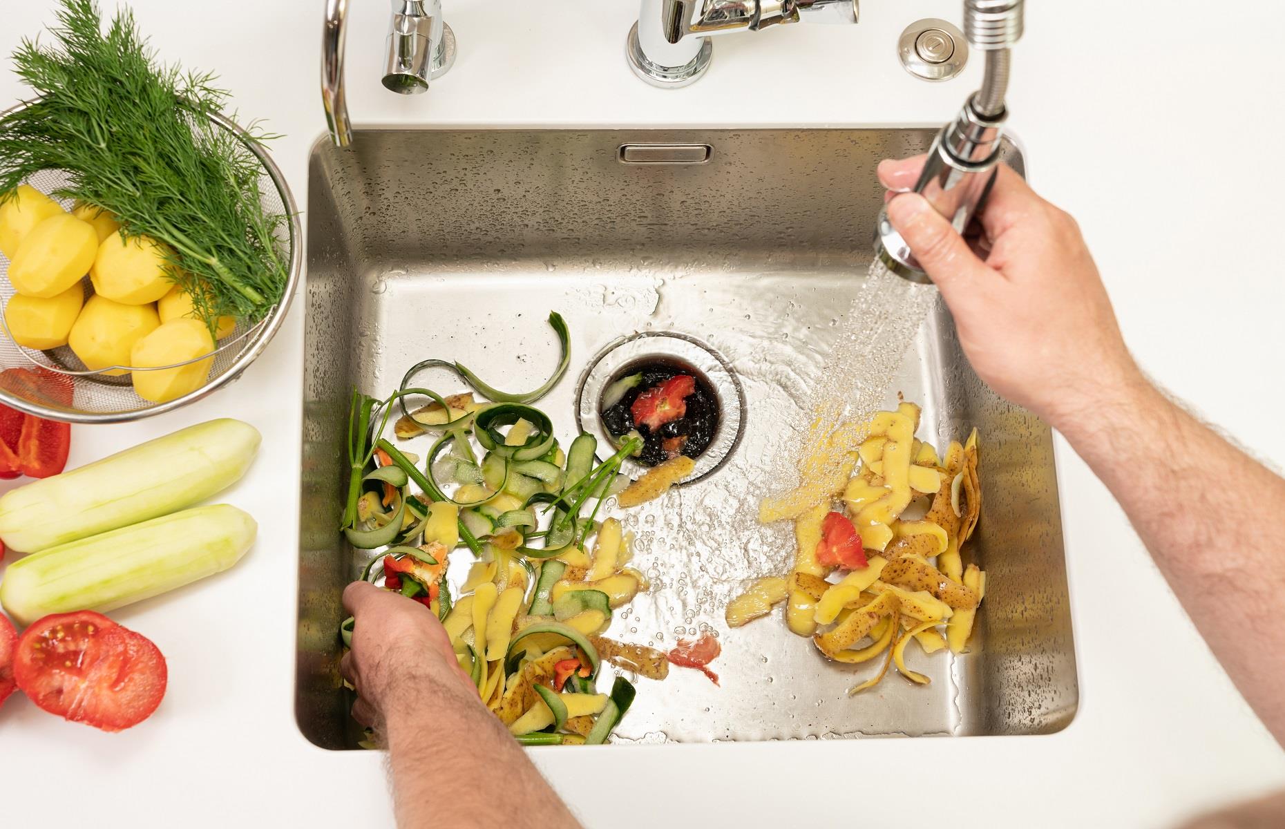 Garbage disposal units and kitchen features