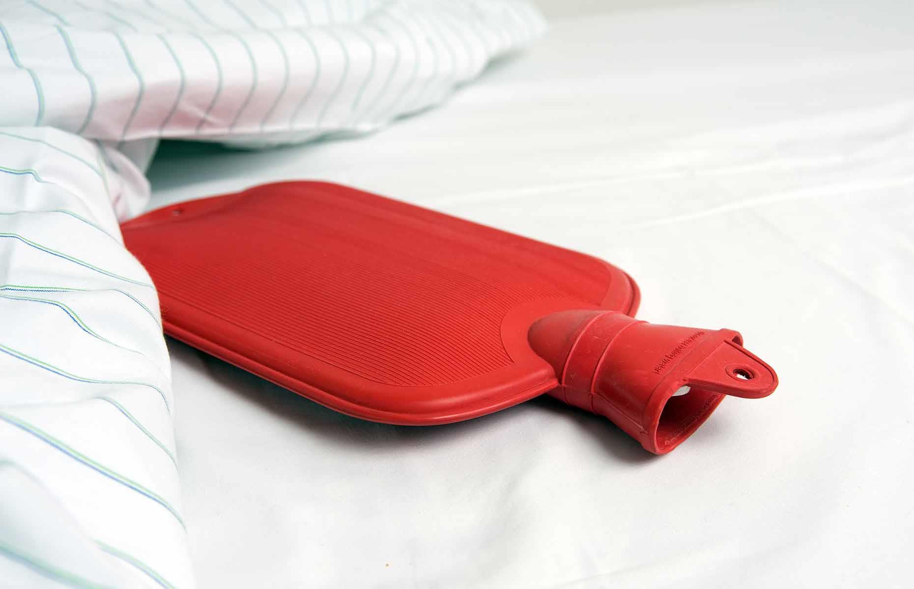 Fill a hot water bottle with ice 