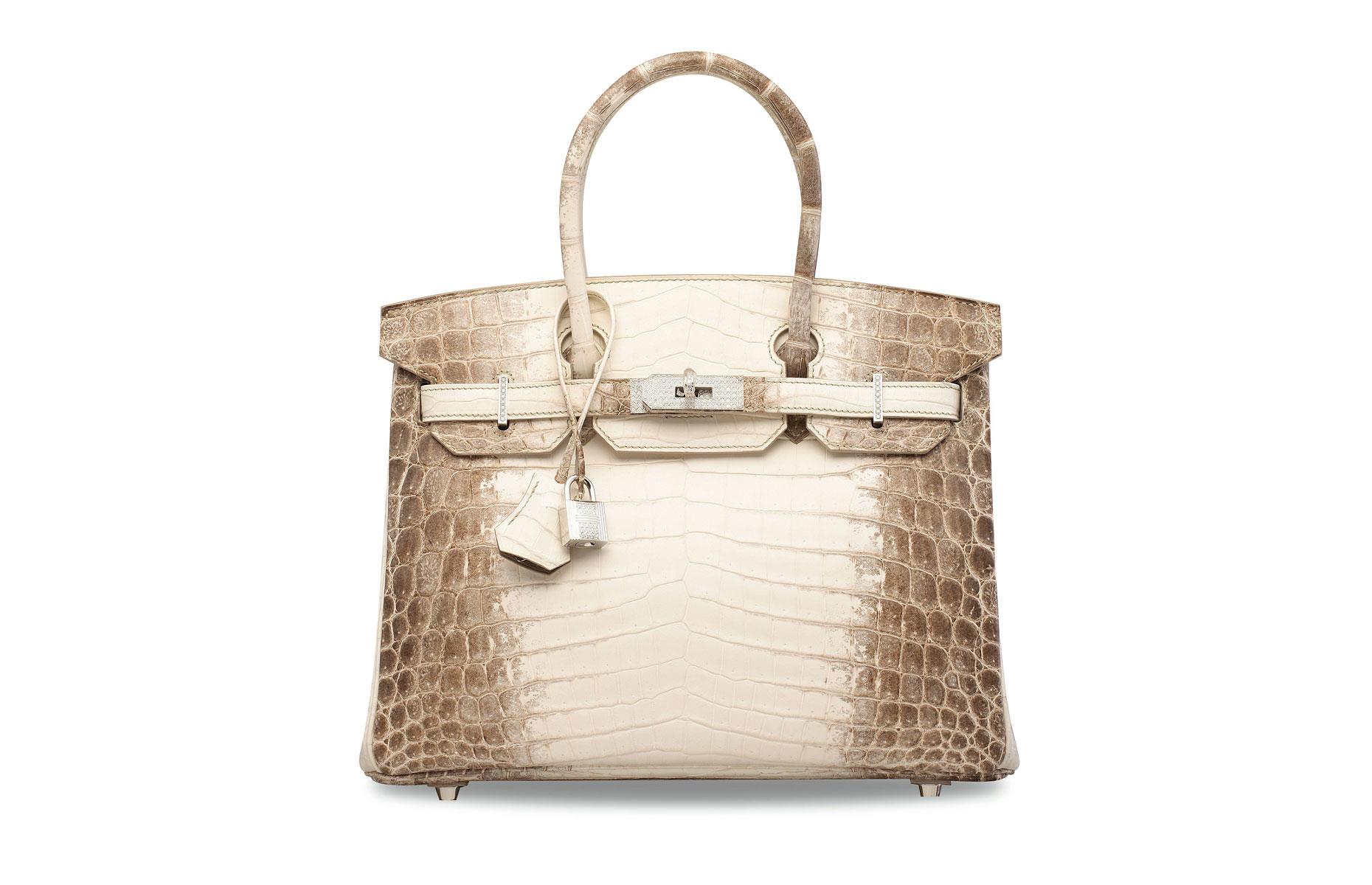 May: a diamond-encrusted crocodile Hermès Birkin bag sells for a record $379,261 (£289k)