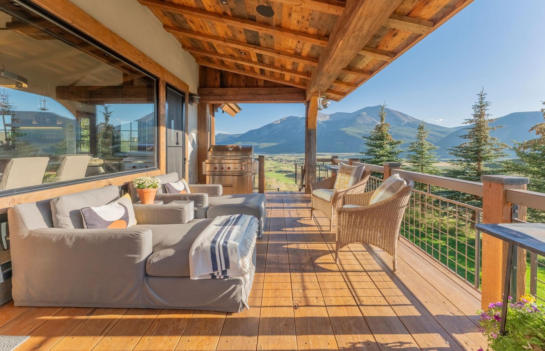 Contemporary mountain retreat: balcony with alpine vistas