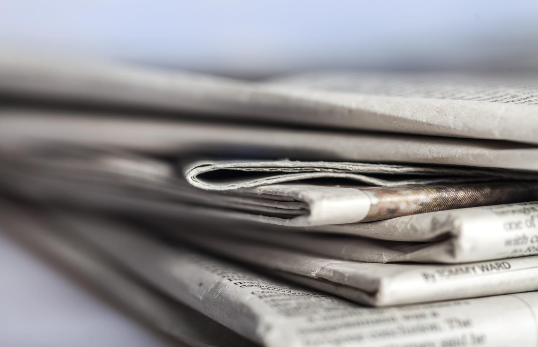 Use newspaper to kill weeds