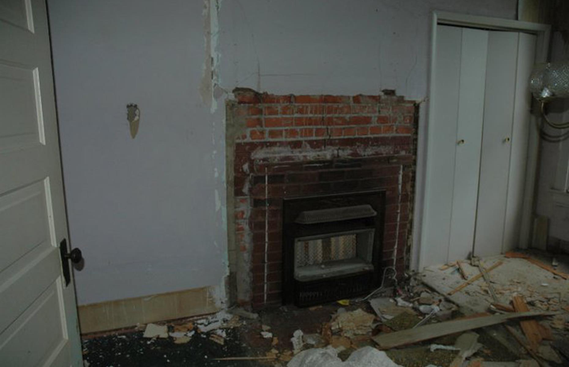 Before: the bathroom fireplace