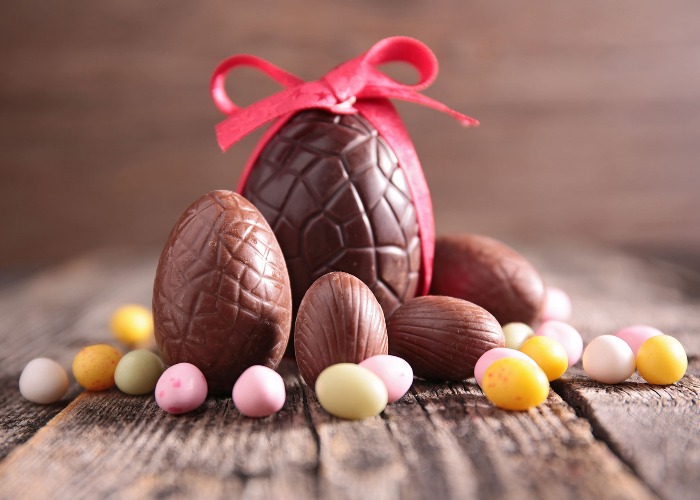 happy easter egg decorated with shape of fish scales flowers