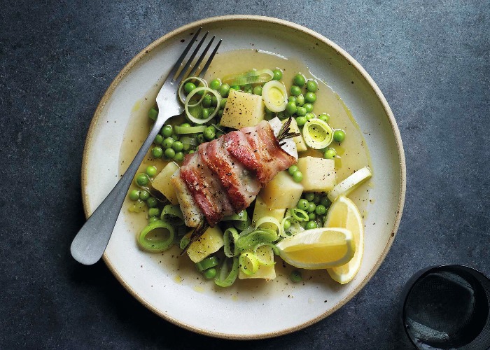 Bacon-wrapped cod with peas, leeks and potatoes recipe