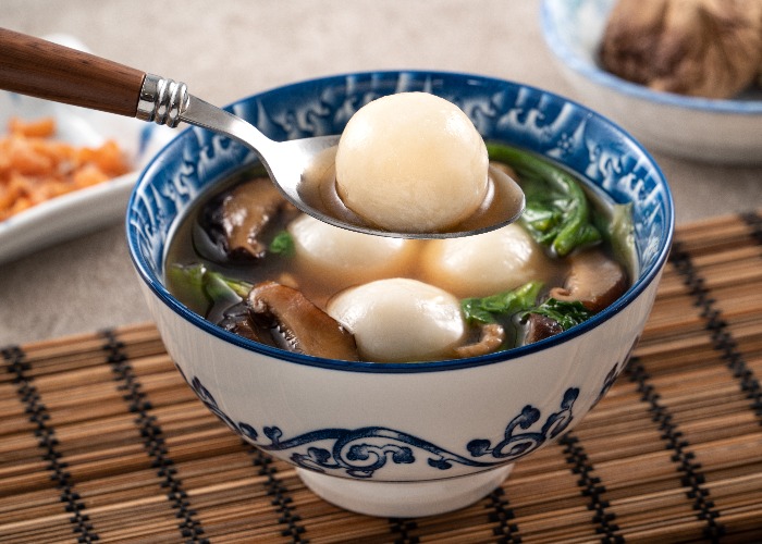 Lunar New Year pork tang yuan dumplings and meatballs noodle soup