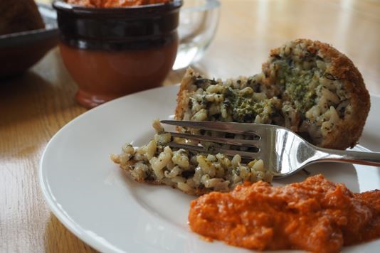 Arancini with rocket pesto and Romesco sauce recipe
