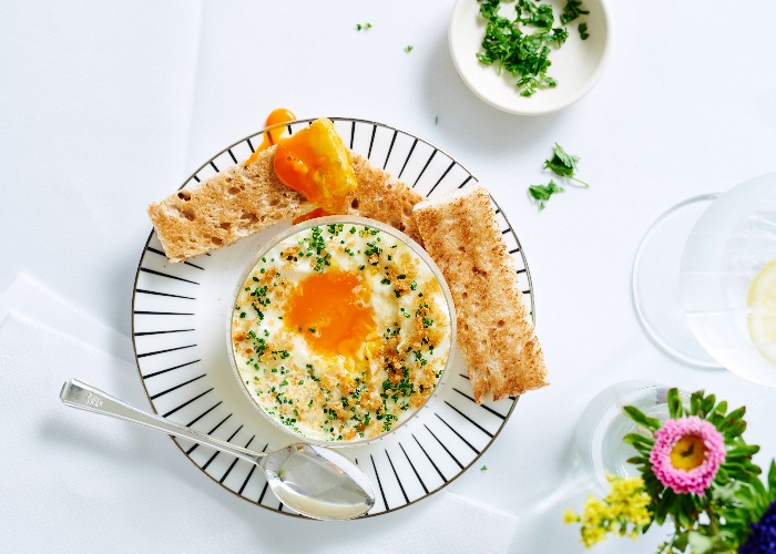 Eggs en cocotte with smoked haddock, leeks and chives recipe