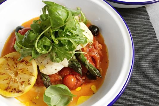 Baked cod with charred asparagus and chunky puttanesca sauce recipe