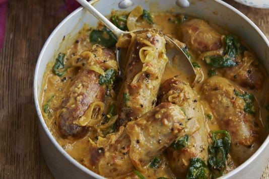 Curried sausages and spinach recipe