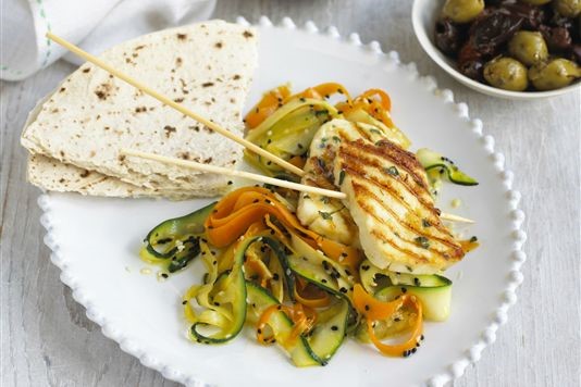 Grilled marinated halloumi on seeded vegetable ribbons recipe