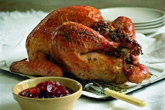 Roast turkey with traditional stuffing and cranberry sauce recipe