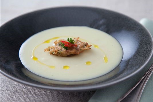 Herby potato soup with spiced crab fritter recipe