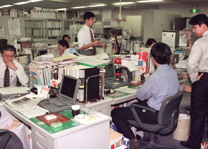 Rare historic photos reveal office life through the decades
