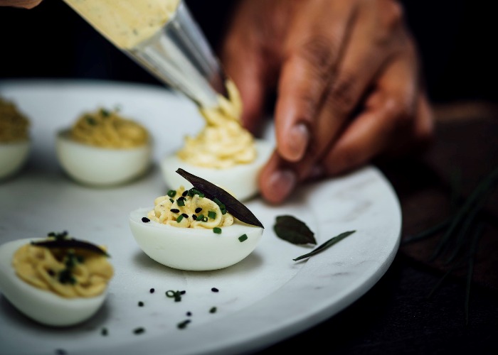 Devilled eggs with creamy tahini and za’atar
