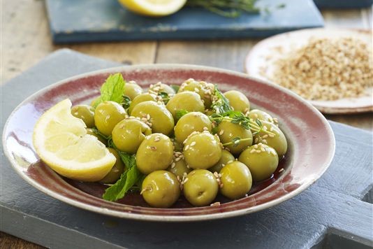 Green olives, sesame seeds, lemon juice and mint recipe